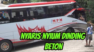 MOMEN MENEGANGKAN NYARIS BUS MPM NYIUM DINDING BETON DI TIKUNGAN  SITINJAU LAUIK SUMATRA BARAT