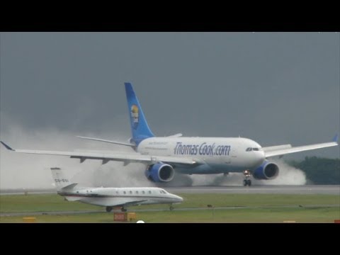 TCX A330-200 reverse thrust landing. Manchester Airport. HD.
