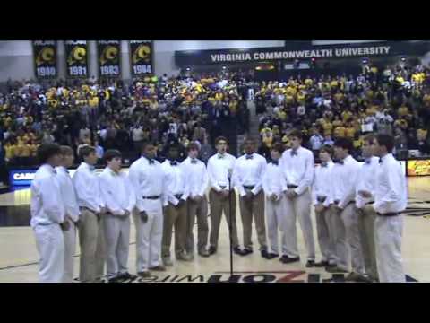 St. Christopher's Beaux Ties sing National Anthem