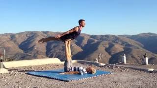 Shoulder stand from bird - Simons Akroyoga