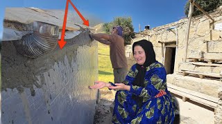 Completing a waterproof house: A nomadic lady prepares for winter