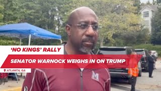 Senator Raphael Warnock speaks during "No Kings" protest in Atlanta