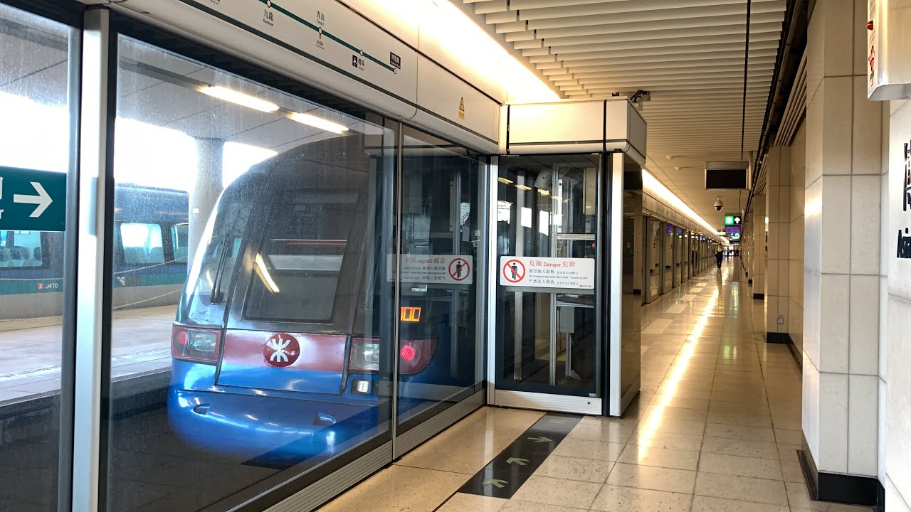 Airport Express CAF-Train E107/K407 Departing out of AsiaWorld Expo ...