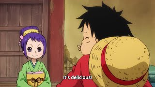 Luffy memakan nasi porsi besar yang dimasak oleh Otama.