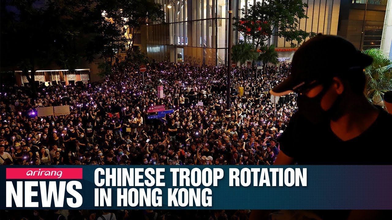 China rotates new troops into Hong Kong amid crackdown fears as another ...
