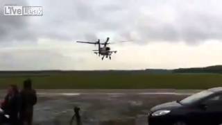 Low Apache fly by + precautionary landing in a field