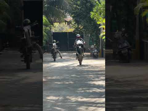 When the RR310 meets the RTR200… the front wheels disappear