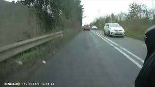 V88 CLO - Overtakes by crossing solid white line with oncoming traffic