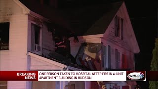 Police help rescue people from Hudson fire
