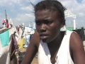 Residents of Port-au-Prince Slum Say Aid Slow in Coming