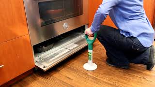 EZ Riser clip 02 takes pan from under stove