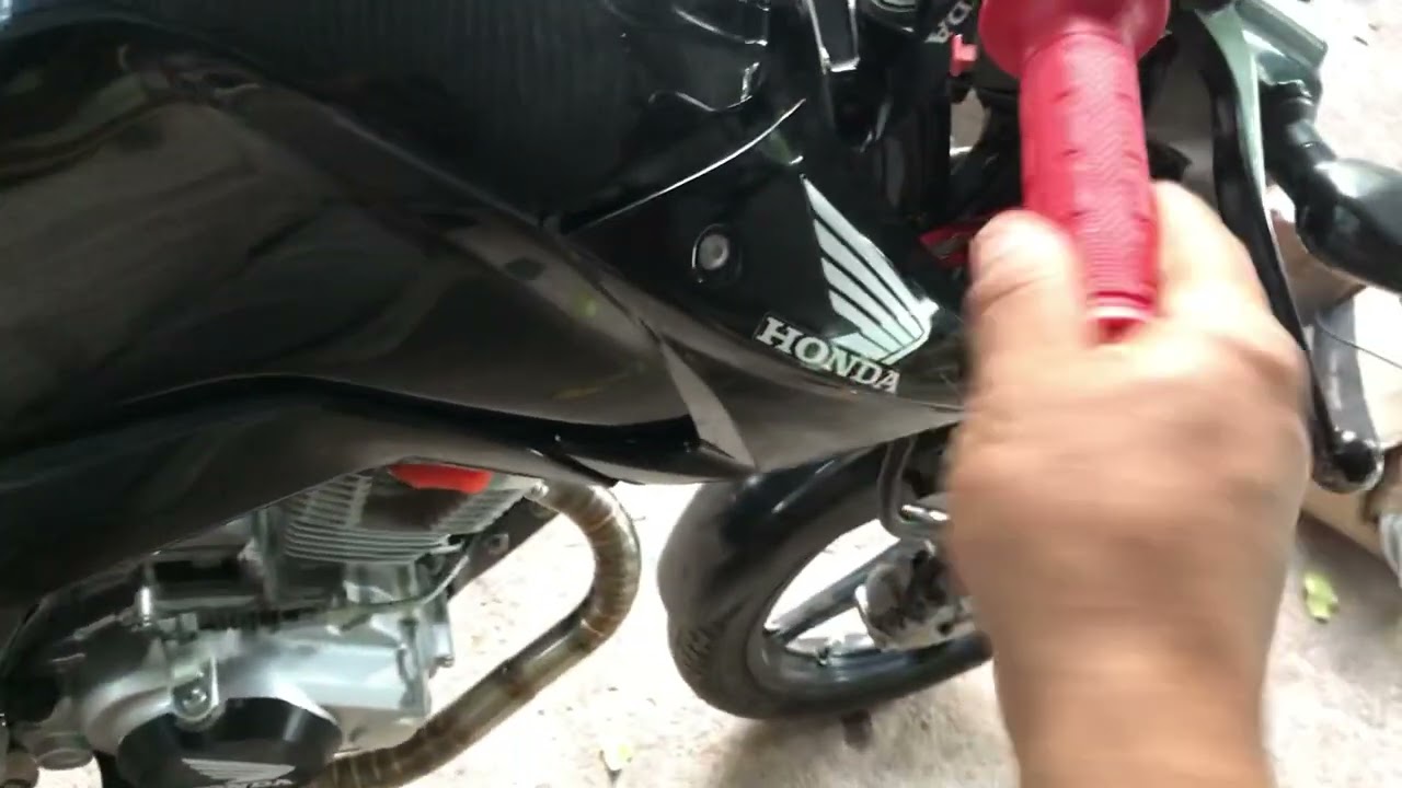 Titán 190cc con escape rr inoxidable