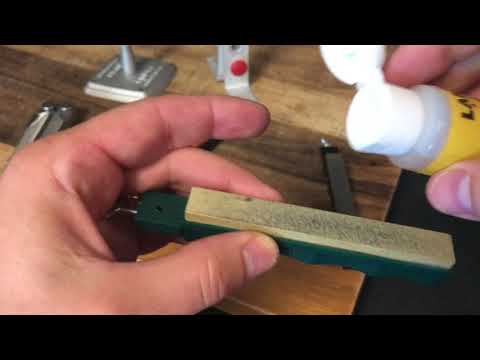 Cleaning the Lansky sharpening system.