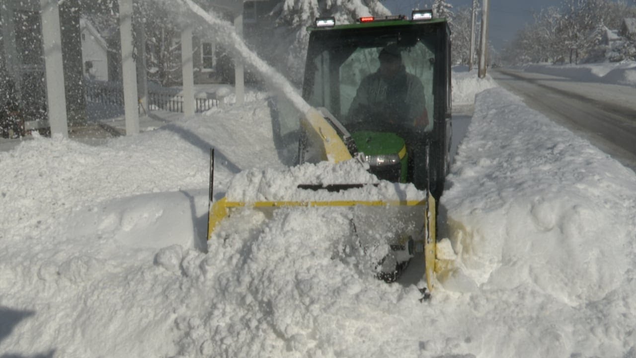 Adams Center residents dig out after 4 feet of snow fell Tuesday - YouTube