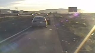 Video shows man drive off with NMSP officer, who then shot suspect