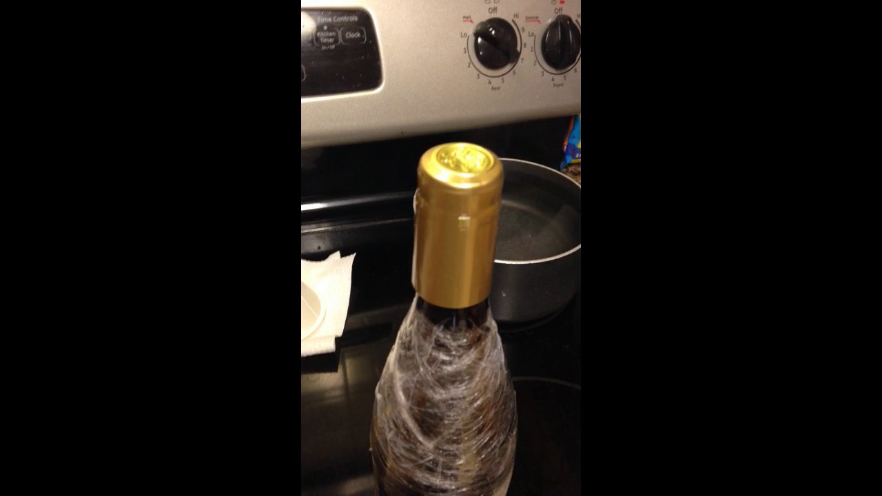 Putting Liquor in Wine Bottle and Recapping. Getting liquor on cruise