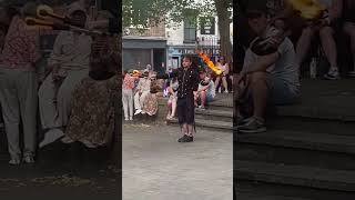 Watching the Street Performer