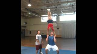 partner stunt first hand in hand full to feet