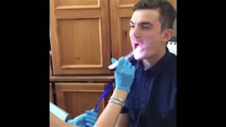 Young Adult Oral Motor Exam Using Throat Scope
