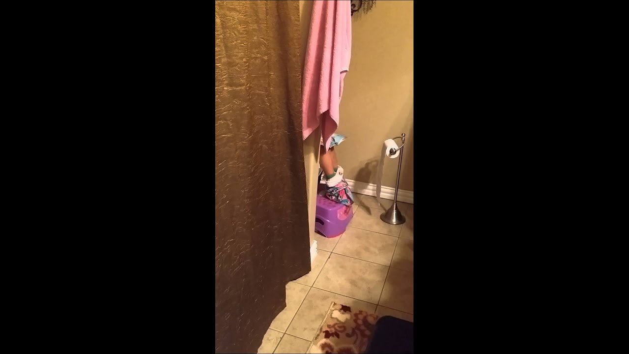 Potty talk, looking at a Dora book