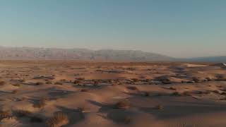 Cinematic Drone Shot of Vast Mojave Desert Dunes at Sunrise | Free Stock Video News
