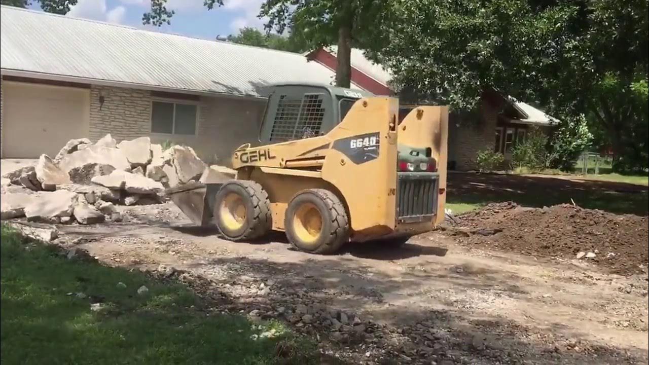 Breaking up old concrete driveway to install a new asphalt driveway. YouTube