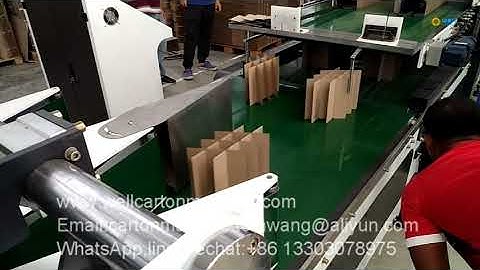Corrugated cardboard partition inserting machine