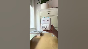 Print shipping labels easily with mini printer, no ink needed!