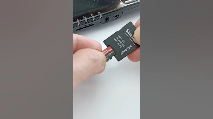 Inserting a micro SD into the adapter to be plugged into the SD slot on a laptop like this #shorts