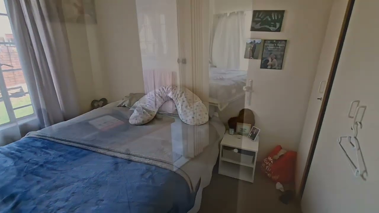 Spacious full-title cluster home with private garden