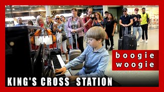 Boogie-woogie on the HONKY TONK piano by Olivier at King's Cross St Pancras Station.