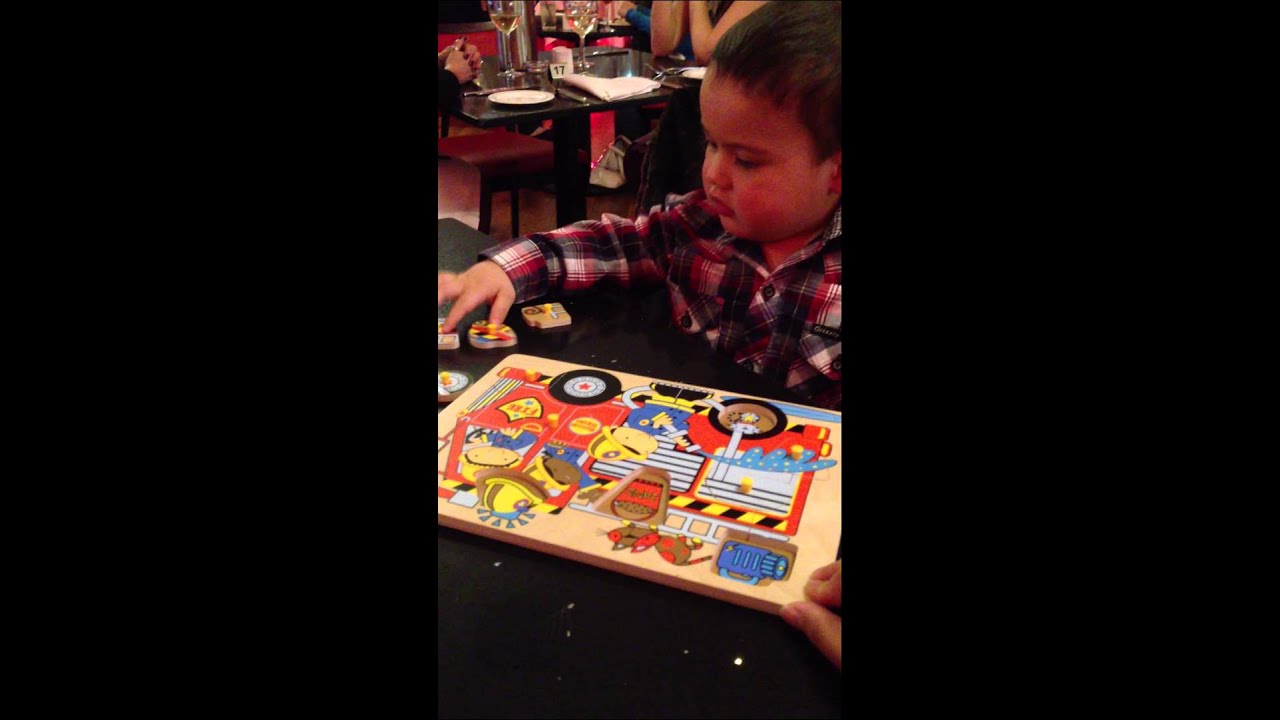 My 20 month old baby doing his Puzzle