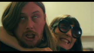Hooveriii - The Tall Grass (Official Video)
Los Angeles Hooveriii (pronounced Hoover 3) have announced the October 13 release of their newest album, Pointe via The Reverberation Appreciation Society. To ring in the announcement, the band has shared the LP’s first single and a video for “The Tall Grass.”
“Every record is kind of a response to the last record and I like listening to people’s discographies like that,” Hoover explains. “When we finished A Round Of Applause we were in rock mode playing with a lot of rock and psych bands and I was really thinking about what do you do with a fourth record?” The answer turns out to be something more esoteric and less predictable than a guitar-driven album while retaining the core of the band’s sound, which has made the Los Angeles-based act such an exciting act to watch evolve. From the spacey groove of the opener “Prom” to the expansive, synth-friendly ballad “This Rock” and the epic future-folk experimentation of the album’s closer “Dreaming” (which features vocals by Anna Wallace), Pointe is an album that references the past while stretching toward an unknown future.
Wisely armed with bliss to fight our age of calamity, LA psych-kraut explorers Hooveriii return with their pastoral and expansive new album. “Pointe” is not the sound of Hooveriii maturing. It’s the sound of a band at the height of their power ascending.
Director: Alex Bulli
Cast: Annie Wonder
Gabriel Salomón
Matthew Zuk
Bert Hoover
Kaz Mirblouk
Pointe is out October 13th on Deluxe Colored Vinyl, CD and streaming. Be sure to pre-order the record @ https://bit.ly/RVRB-075 Hooveriii - The Tall Grass (Official Video)