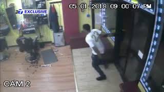 Video shows shooting during barbershop robbery