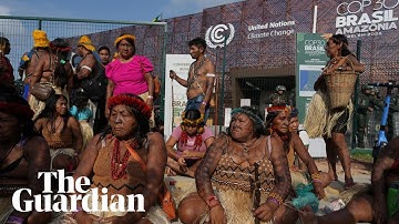 Indigenous protesters block entrance to Cop30 summit venue