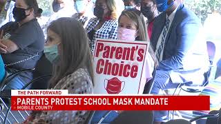 Woman wears space helmet in Mobile County School Board meeting in protest of mask policy-NBC 15 WPMI