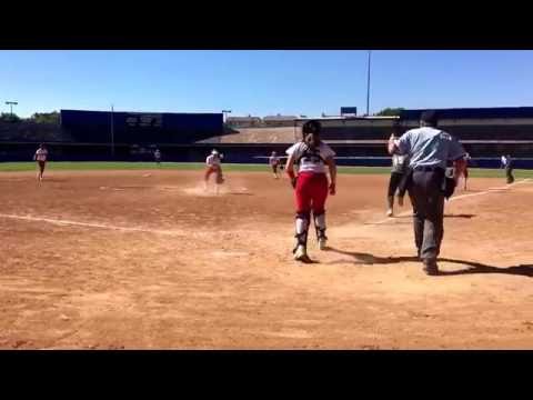 Shelbie makes the play on the comebacker