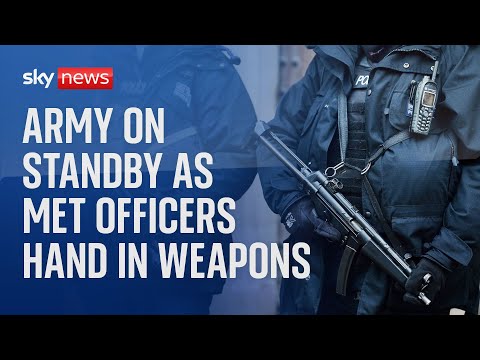 Met Police: Army on standby as officers hand in weapons