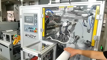 High Speed Turret rewinder machine with automatic labelling at end instead of hotmelt glue.