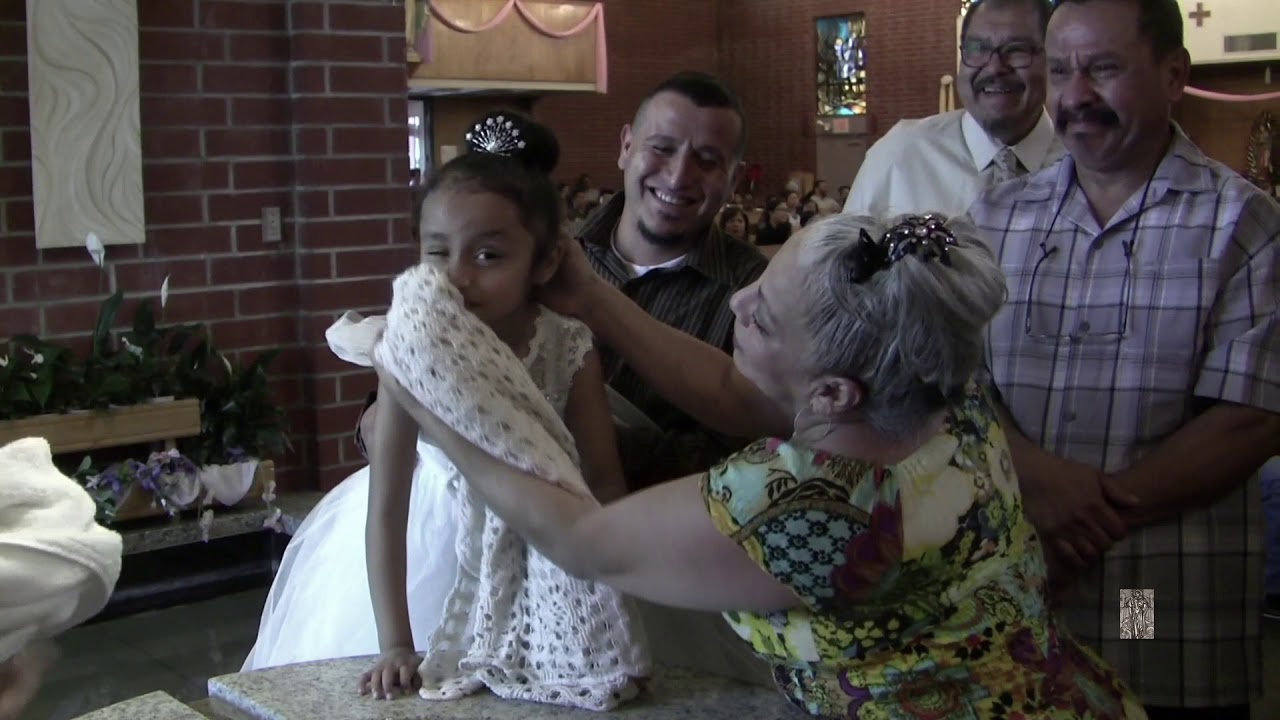 Emma-Star Rodriguez receives the sacrament of baptism