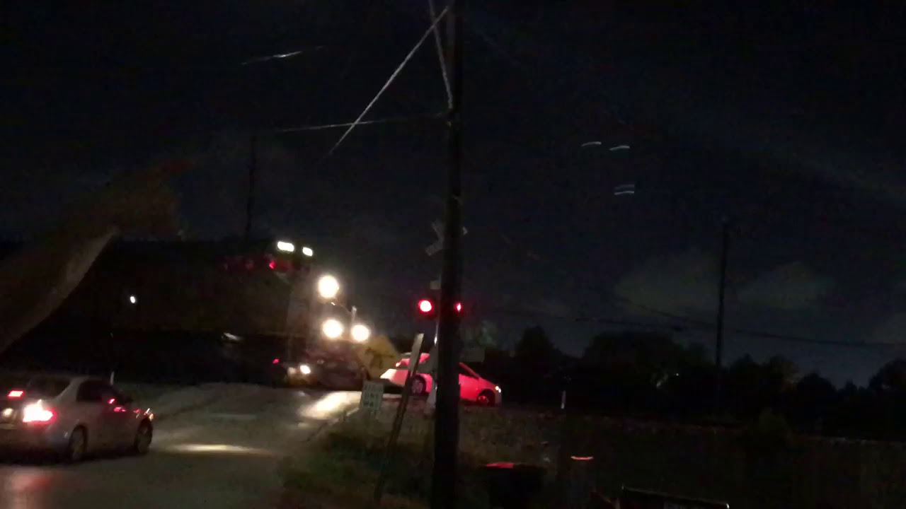 Train slams into car stuck on tracks near Memorial Park - YouTube
