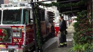FDNY ENGINE 23 GETTING A SCRUB FOR CHRISTMAS ON WEST 58TH ST. & A QUICK PEEK INTO THE FIREHOUSE.
