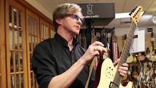 How to adjust and attach a guitar strap by Levy's - YouTube