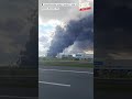 Drone Strike Triggers Smoke Near Wildberries Warehouse in Russia