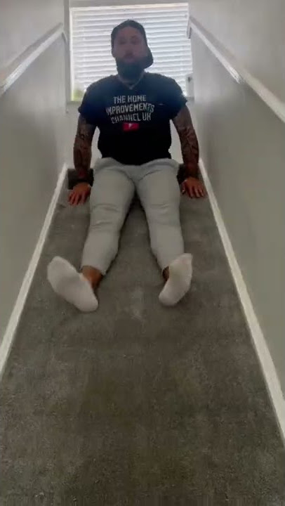 HOW TO MAKE AN INDOOR SLIDE ON YOUR STAIRS 🛝 #stairs #slide #carpet #diy  #homeimprovement #shorts