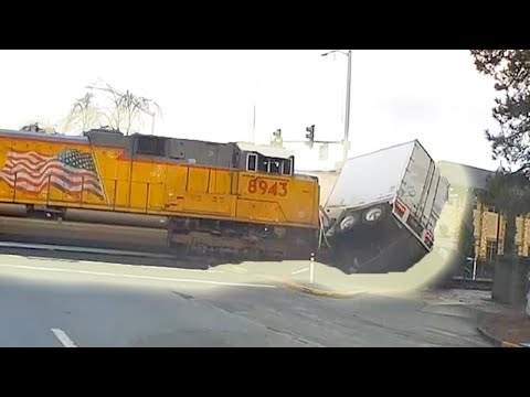 Train Collides With Truck's Trailer