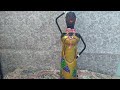 Boneca africana feita com garrafa de desinfetante