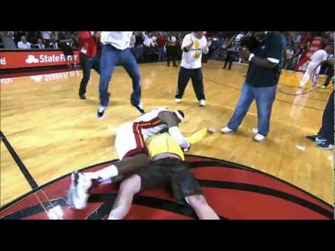 LeBron tackles Heat fan who hits $75,000 shot!