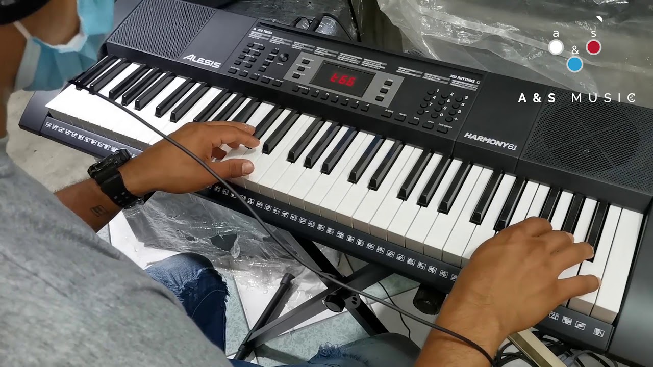 Alesis Melody 61 piano numérique 61 touches pour débutants avec  haut-parleurs, support, clavier banc, casque, micro, pupitre, 300 sons et  leçons de musique : : Instruments de musique et Sono