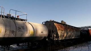 2 NBSR's/CN 396 w/IC 2722, CN 2561, CN 3243 & NBSR's 403 & 4309 lead this long 618 axle, EB Autorack